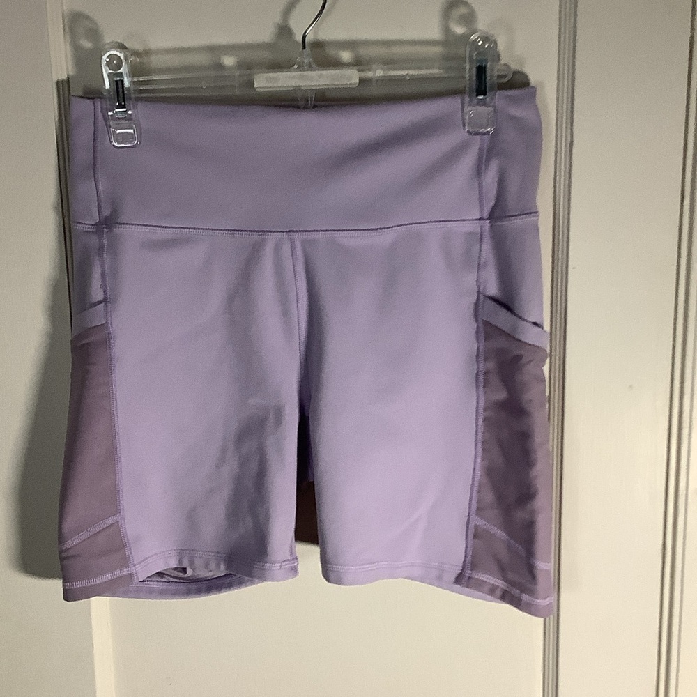 Fabletics PowerHold Lavender High-Waist Bike Shorts with Side Mesh Pockets